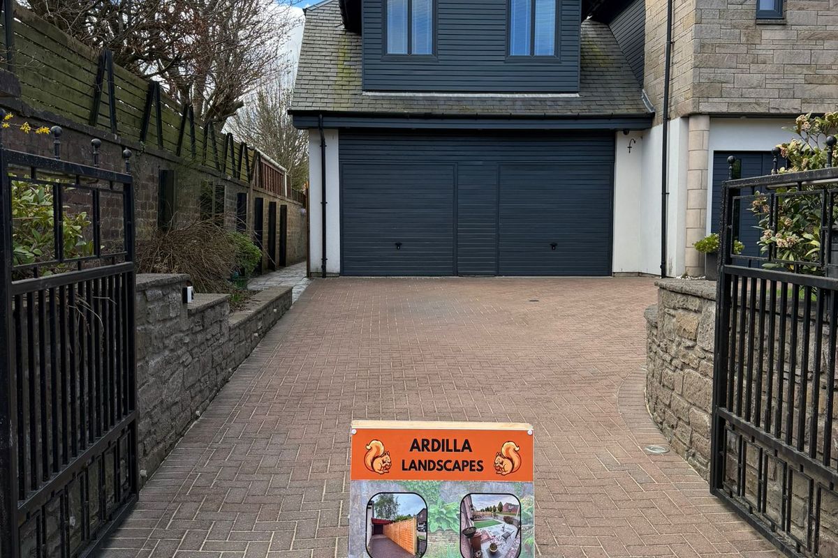 Clean block paving driveway after jet washing by Ardilla Landscapes