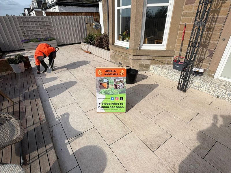 Dirty porcelain patio before cleaning in Dundee