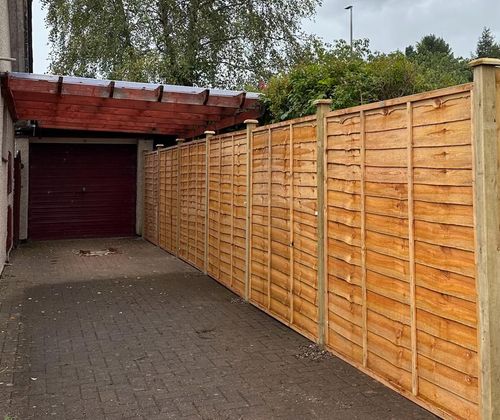 Driveway fencing installation by Ardilla Landscapes