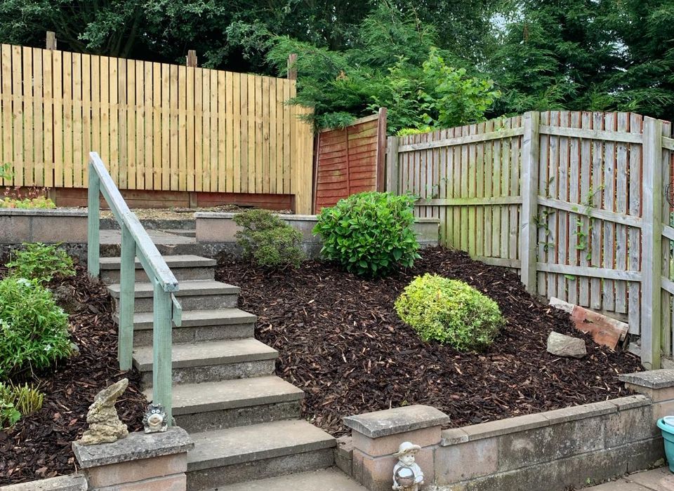 Completed garden landscaping project with steps and gravel in Dundee